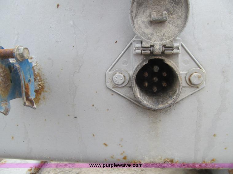 image for item L1849 1999 Trail King bottom dump trailer