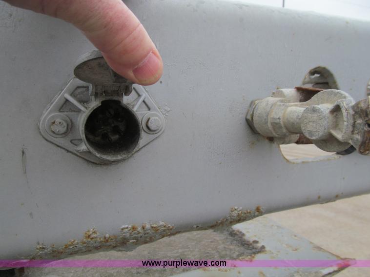 image for item L1849 1999 Trail King bottom dump trailer