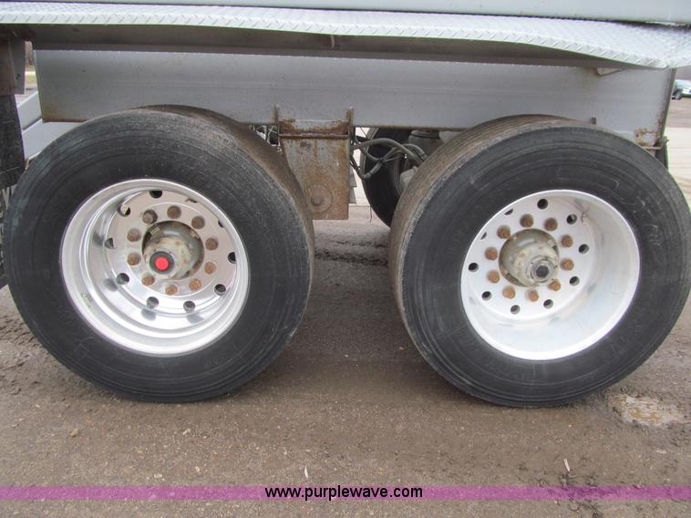 image for item L1849 1999 Trail King bottom dump trailer