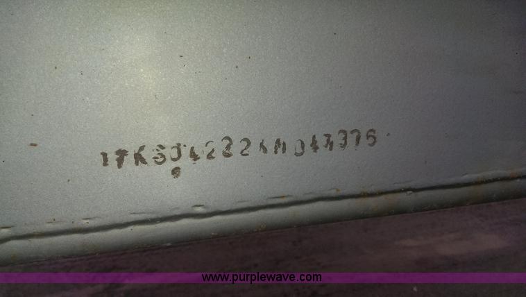 image for item L1849 1999 Trail King bottom dump trailer