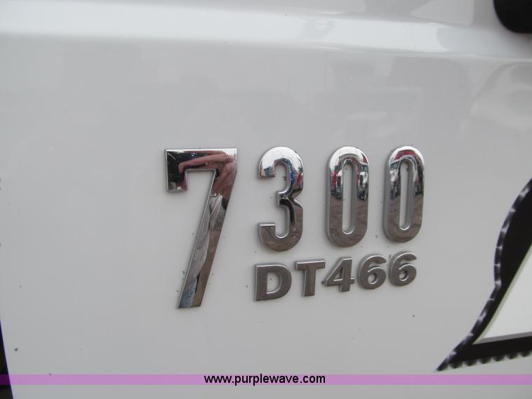 image for item L1854 2002 International 7300 hook truck