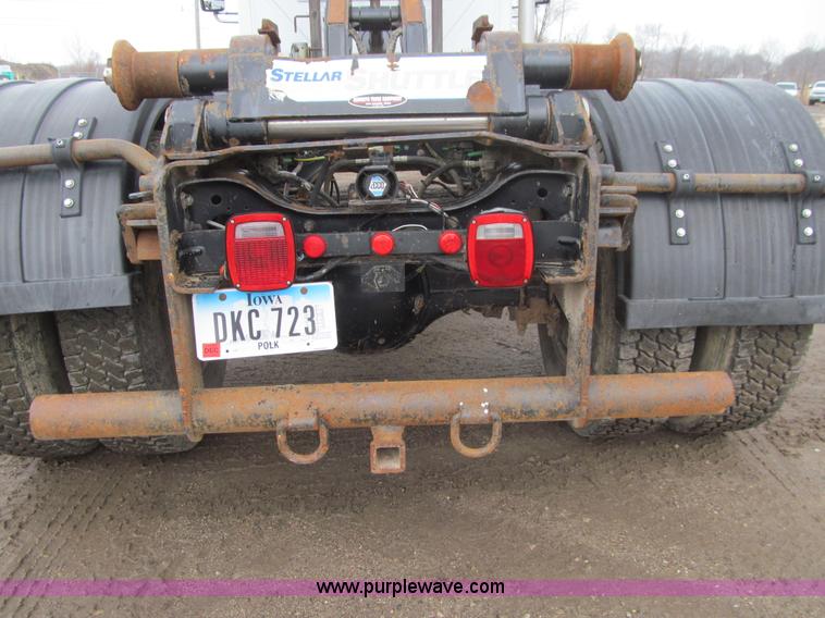 image for item L1854 2002 International 7300 hook truck