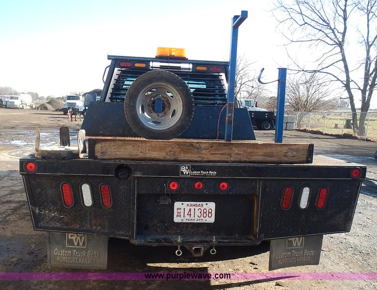 image for item L3595 1999 Ford F450 Super Duty flatbed truck