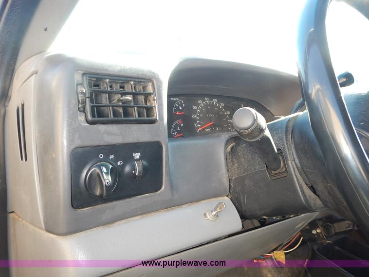 image for item L3595 1999 Ford F450 Super Duty flatbed truck