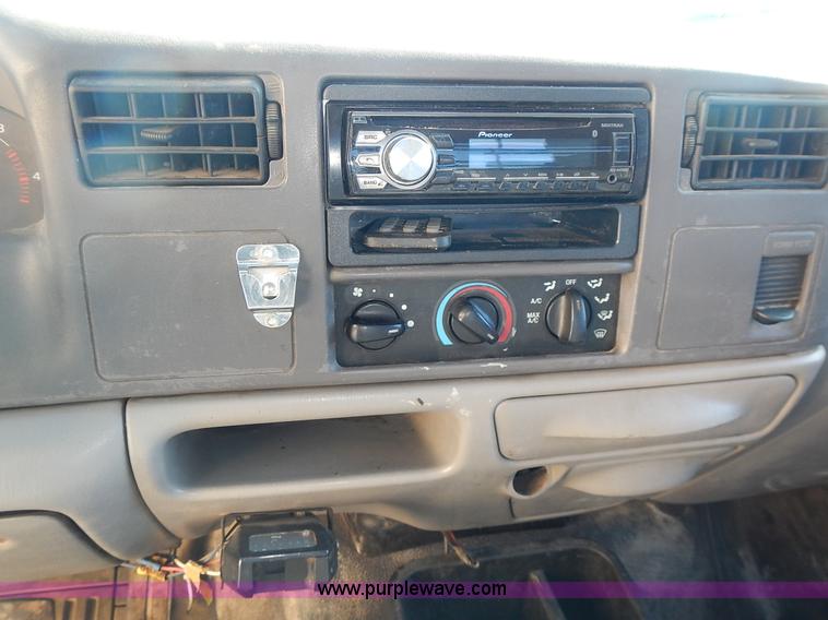 image for item L3595 1999 Ford F450 Super Duty flatbed truck