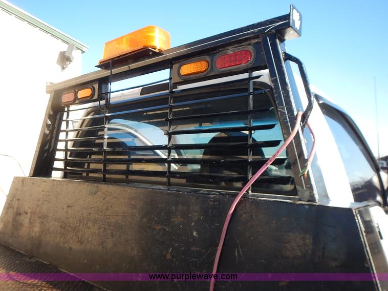 image for item L3595 1999 Ford F450 Super Duty flatbed truck