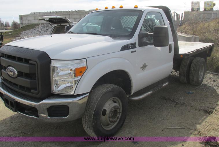 image for item L4165 2011 Ford F350 Super Duty XL flatbed pickup truck