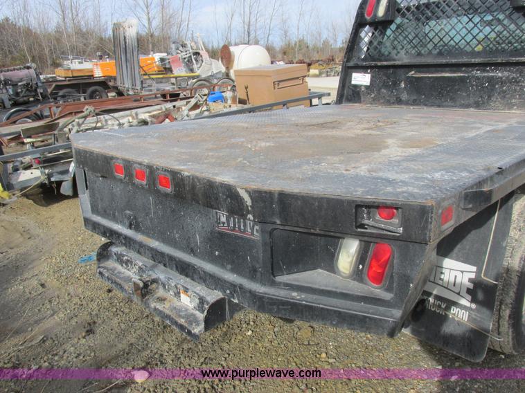 image for item L4165 2011 Ford F350 Super Duty XL flatbed pickup truck