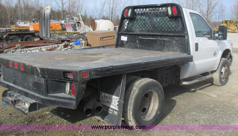 image for item L4165 2011 Ford F350 Super Duty XL flatbed pickup truck
