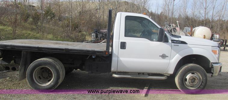 image for item L4165 2011 Ford F350 Super Duty XL flatbed pickup truck