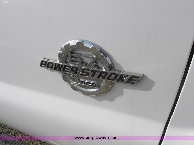 image for item L4165 2011 Ford F350 Super Duty XL flatbed pickup truck