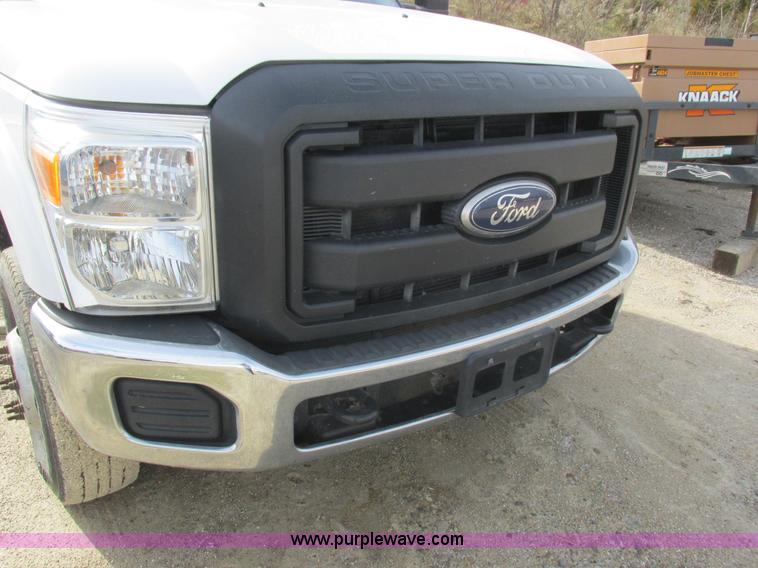 image for item L4165 2011 Ford F350 Super Duty XL flatbed pickup truck