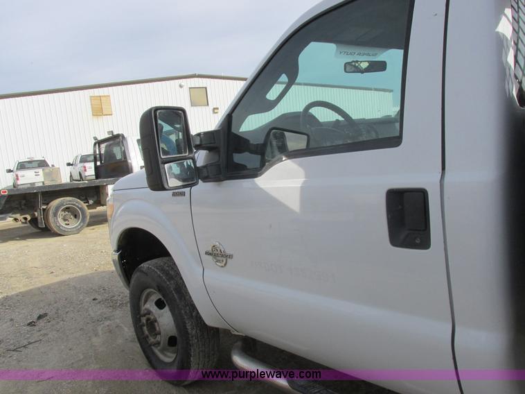 image for item L4165 2011 Ford F350 Super Duty XL flatbed pickup truck