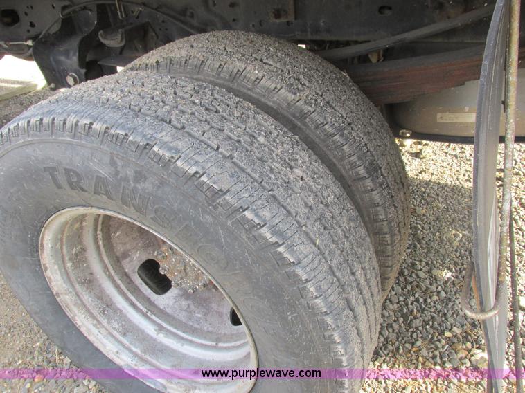 image for item L4165 2011 Ford F350 Super Duty XL flatbed pickup truck