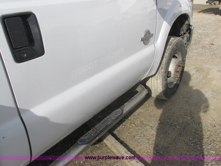 image for item L4165 2011 Ford F350 Super Duty XL flatbed pickup truck