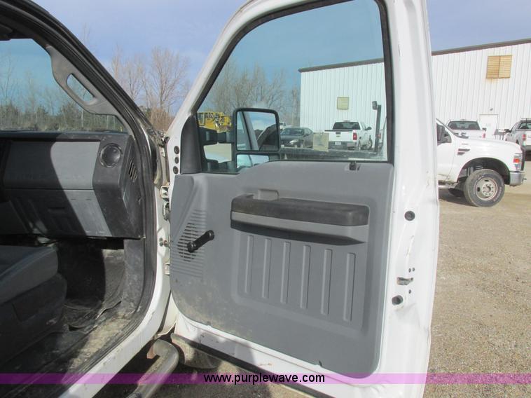 image for item L4165 2011 Ford F350 Super Duty XL flatbed pickup truck