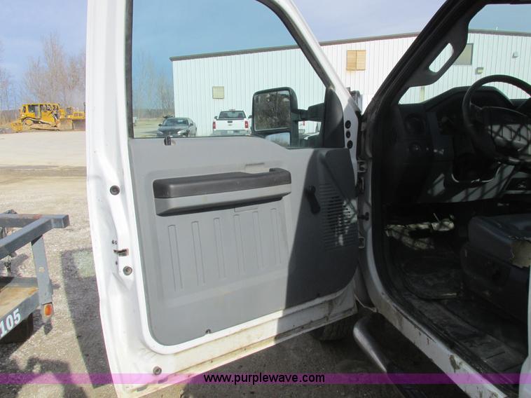 image for item L4165 2011 Ford F350 Super Duty XL flatbed pickup truck