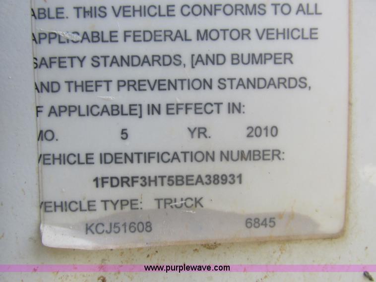 image for item L4165 2011 Ford F350 Super Duty XL flatbed pickup truck