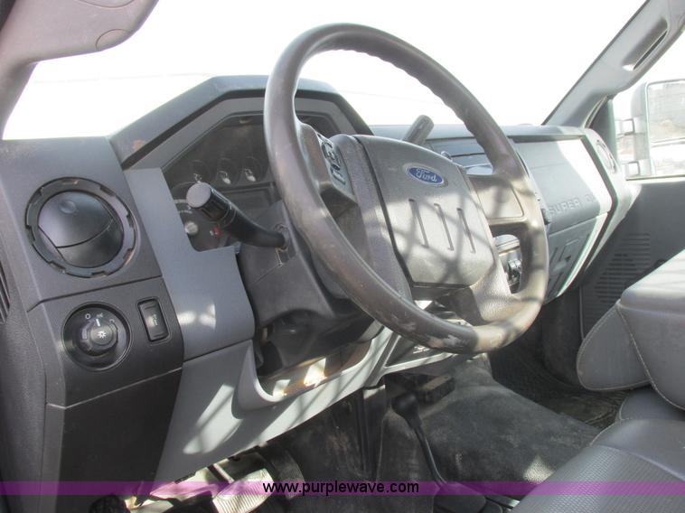 image for item L4165 2011 Ford F350 Super Duty XL flatbed pickup truck