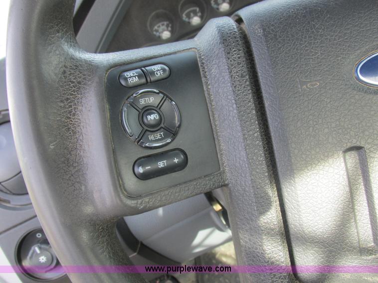 image for item L4165 2011 Ford F350 Super Duty XL flatbed pickup truck