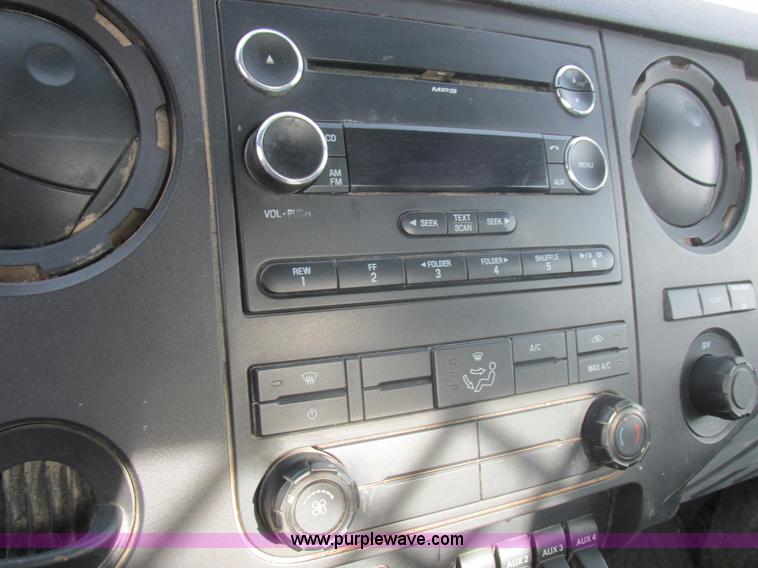 image for item L4165 2011 Ford F350 Super Duty XL flatbed pickup truck