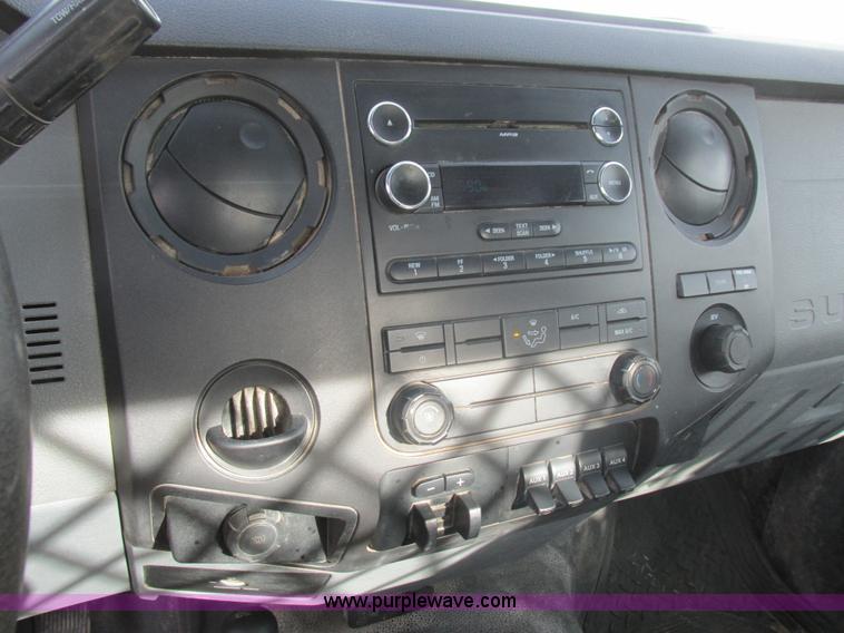 image for item L4165 2011 Ford F350 Super Duty XL flatbed pickup truck