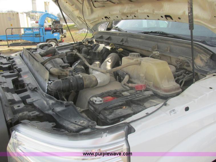 image for item L4165 2011 Ford F350 Super Duty XL flatbed pickup truck