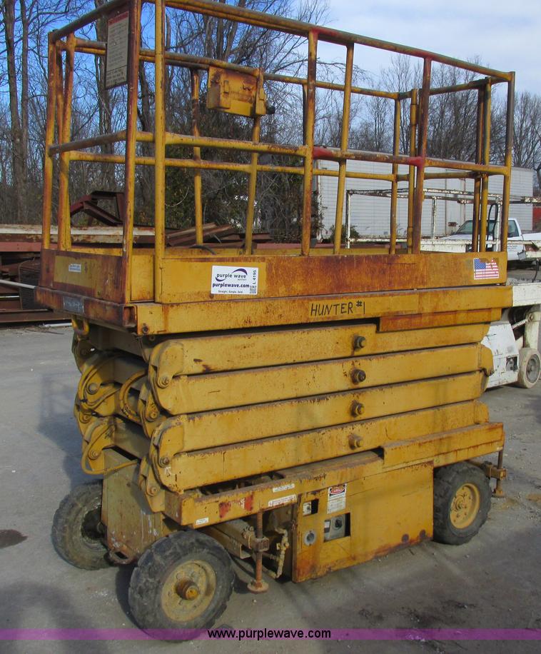Hunter SL3422B scissor lift in Columbia, MO Item L4195 sold