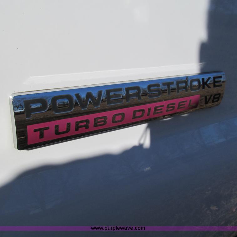 image for item L5346 2005 Ford F450 Super Duty flatbed pickup truck