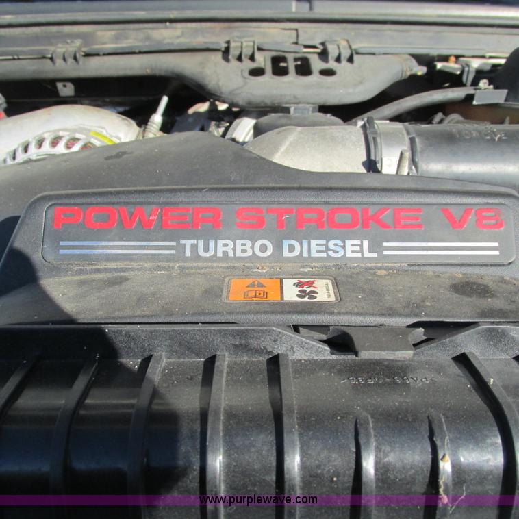 image for item L5346 2005 Ford F450 Super Duty flatbed pickup truck