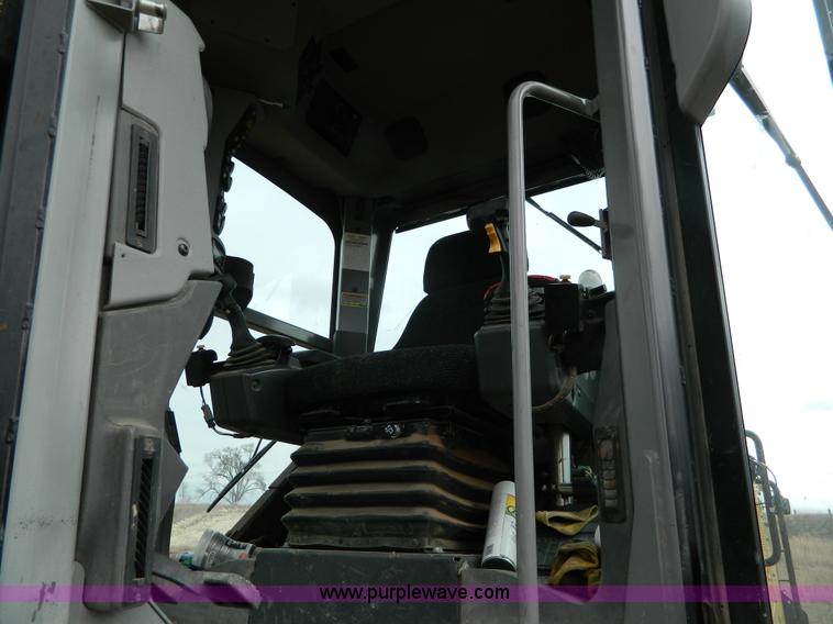 image for item L7286 2010 Caterpillar 160M motor grader