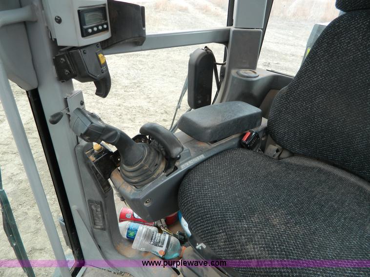 image for item L7286 2010 Caterpillar 160M motor grader