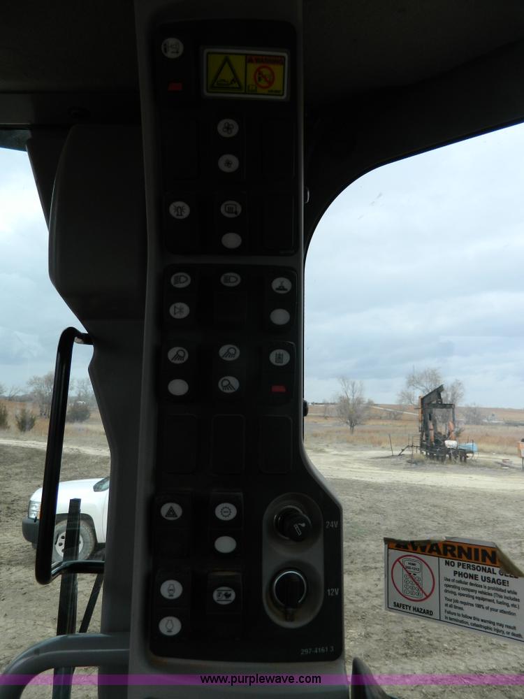 image for item L7286 2010 Caterpillar 160M motor grader