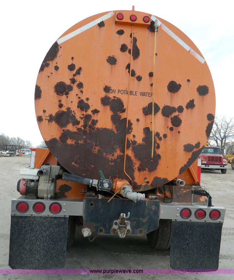 image for item L7293 1987 Freightliner FLC-64T water truck