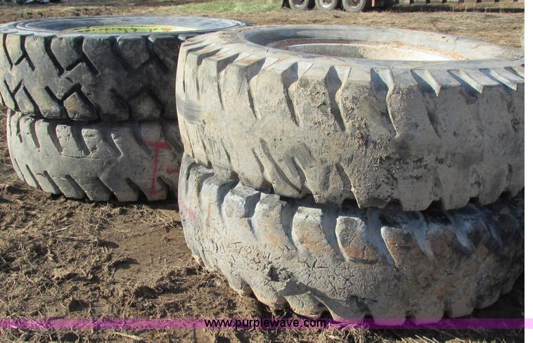 image for item BG9216 (4) 18.00-33 tires and wheels