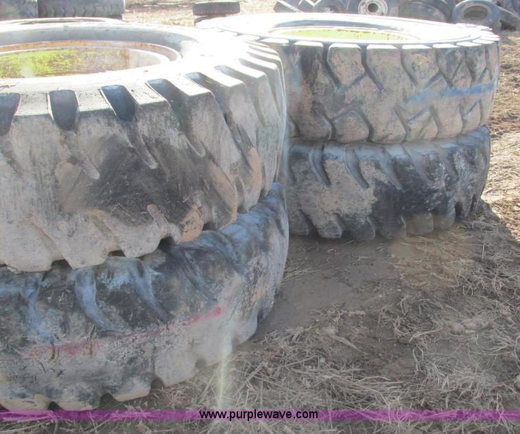 image for item BG9216 (4) 18.00-33 tires and wheels