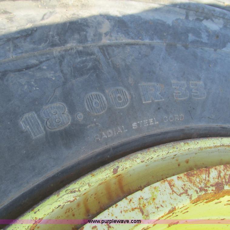 image for item BG9216 (4) 18.00-33 tires and wheels
