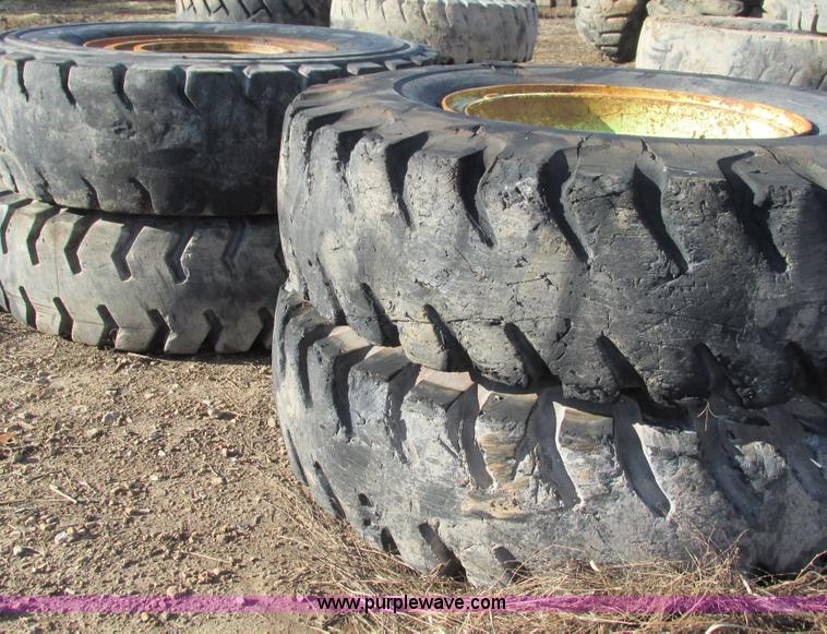 image for item BG9217 (4) 18.00-33 tires and wheels