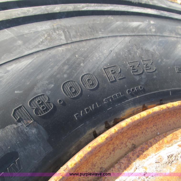 image for item BG9217 (4) 18.00-33 tires and wheels