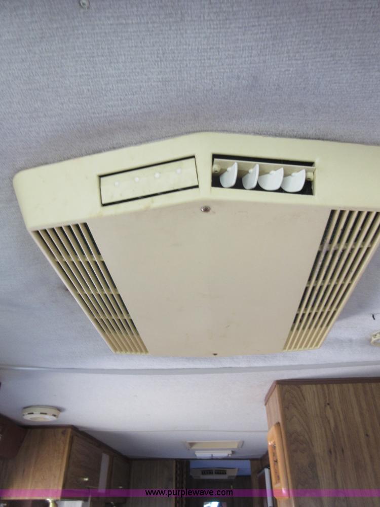 image for item I1910 1984 Chevrolet Holiday Rambler Presidental 33 RV