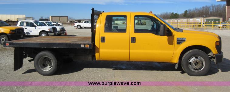 image for item K5263 2008 Ford F350 Super Duty Crew Cab flatbed pickup truck