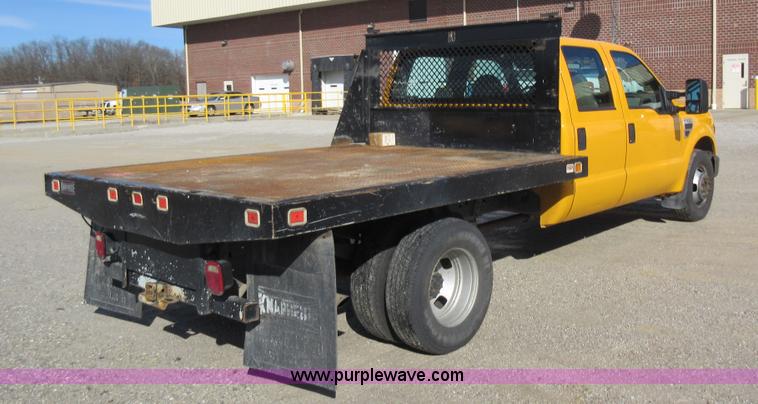 image for item K5263 2008 Ford F350 Super Duty Crew Cab flatbed pickup truck