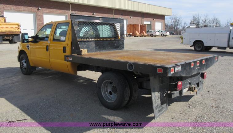 image for item K5263 2008 Ford F350 Super Duty Crew Cab flatbed pickup truck