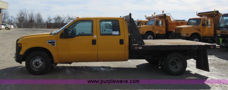 image for item K5263 2008 Ford F350 Super Duty Crew Cab flatbed pickup truck
