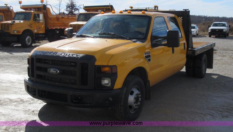 image for item K5263 2008 Ford F350 Super Duty Crew Cab flatbed pickup truck
