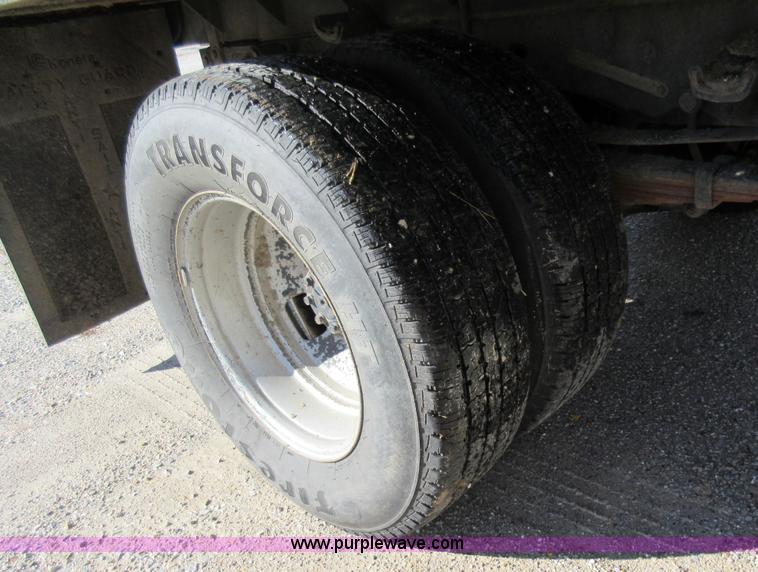 image for item K5263 2008 Ford F350 Super Duty Crew Cab flatbed pickup truck