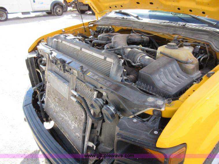 image for item K5263 2008 Ford F350 Super Duty Crew Cab flatbed pickup truck