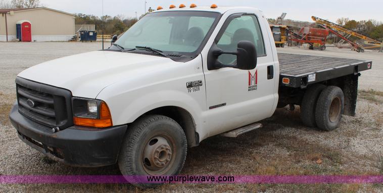 image for item L2350 1999 Ford F350 Super Duty flatbed pickup truck