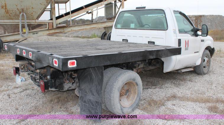image for item L2350 1999 Ford F350 Super Duty flatbed pickup truck