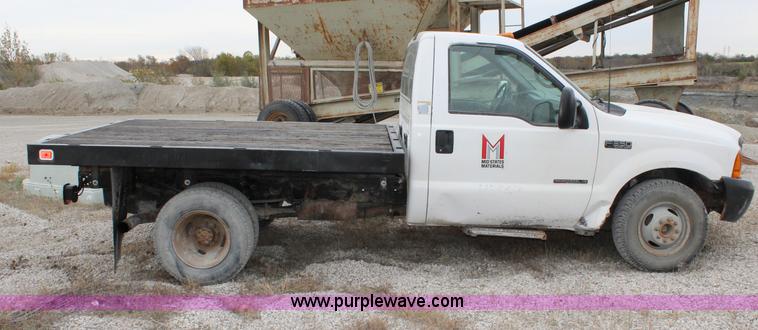 image for item L2350 1999 Ford F350 Super Duty flatbed pickup truck